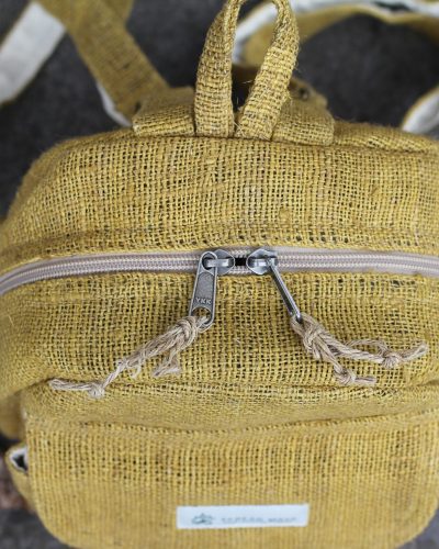 Hempster mini backpack top on the ground