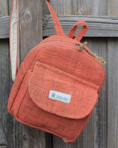 Hempster Mini Backpack facing front hanging on the fence