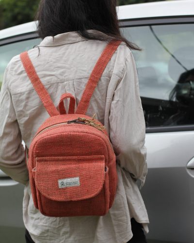 Hempster mini backpack carrying by a woman