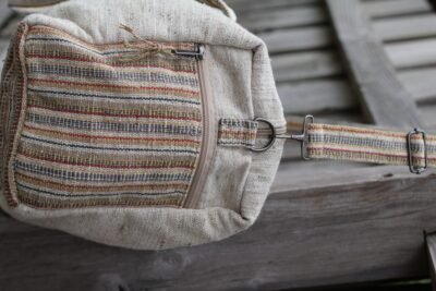 Side view of Spread Maya's handmade hemp duffle bag
