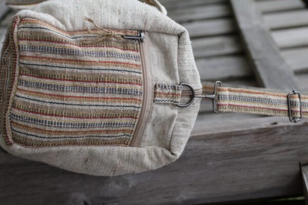 Side view of Spread Maya's handmade hemp duffle bag