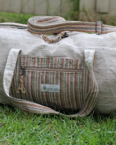 handmade hemp duffle bag with earthy woven front pocket, made in nepal
