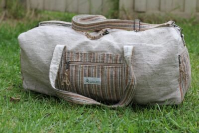 handmade hemp duffle bag with earthy woven front pocket, made in nepal