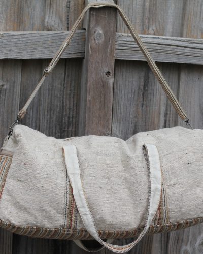 handmade hemp duffle bag with earthy woven front pocket, made in Nepal