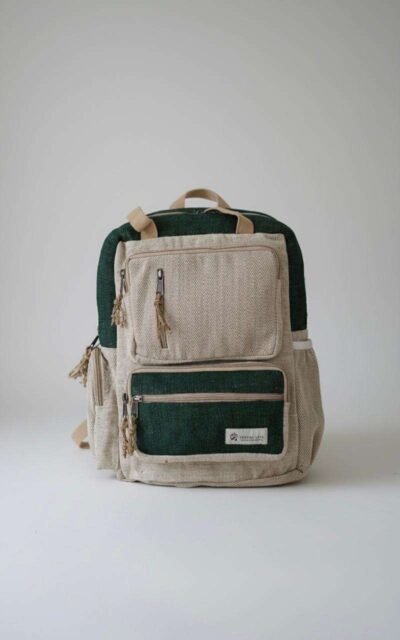 green maternity hemp backpack in plain background
