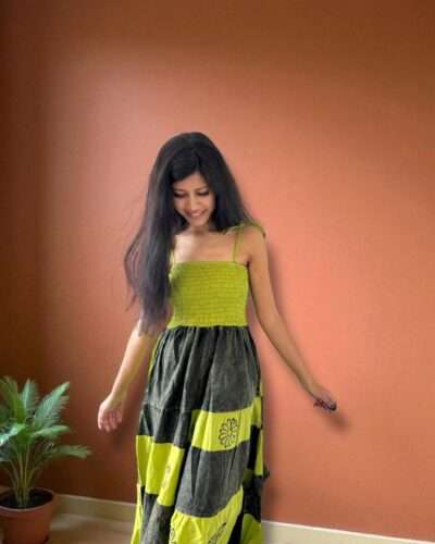 woman wearing handmade cotton dress green