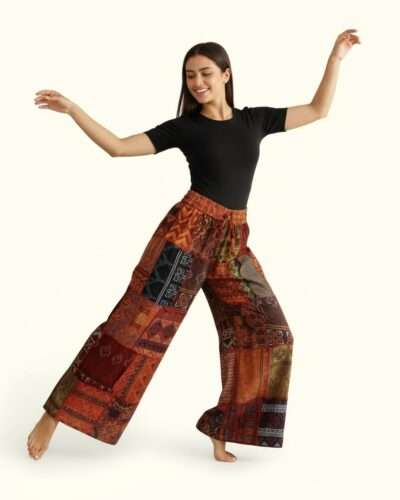 woman dancing wearing boho trousers blaze patchwork