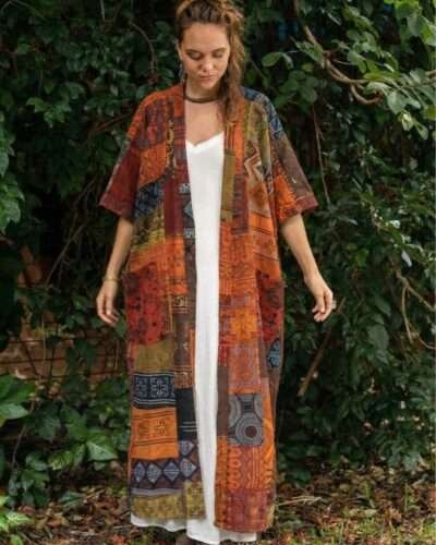 a woman wearing Spreadmaya boho outer and posing in nature