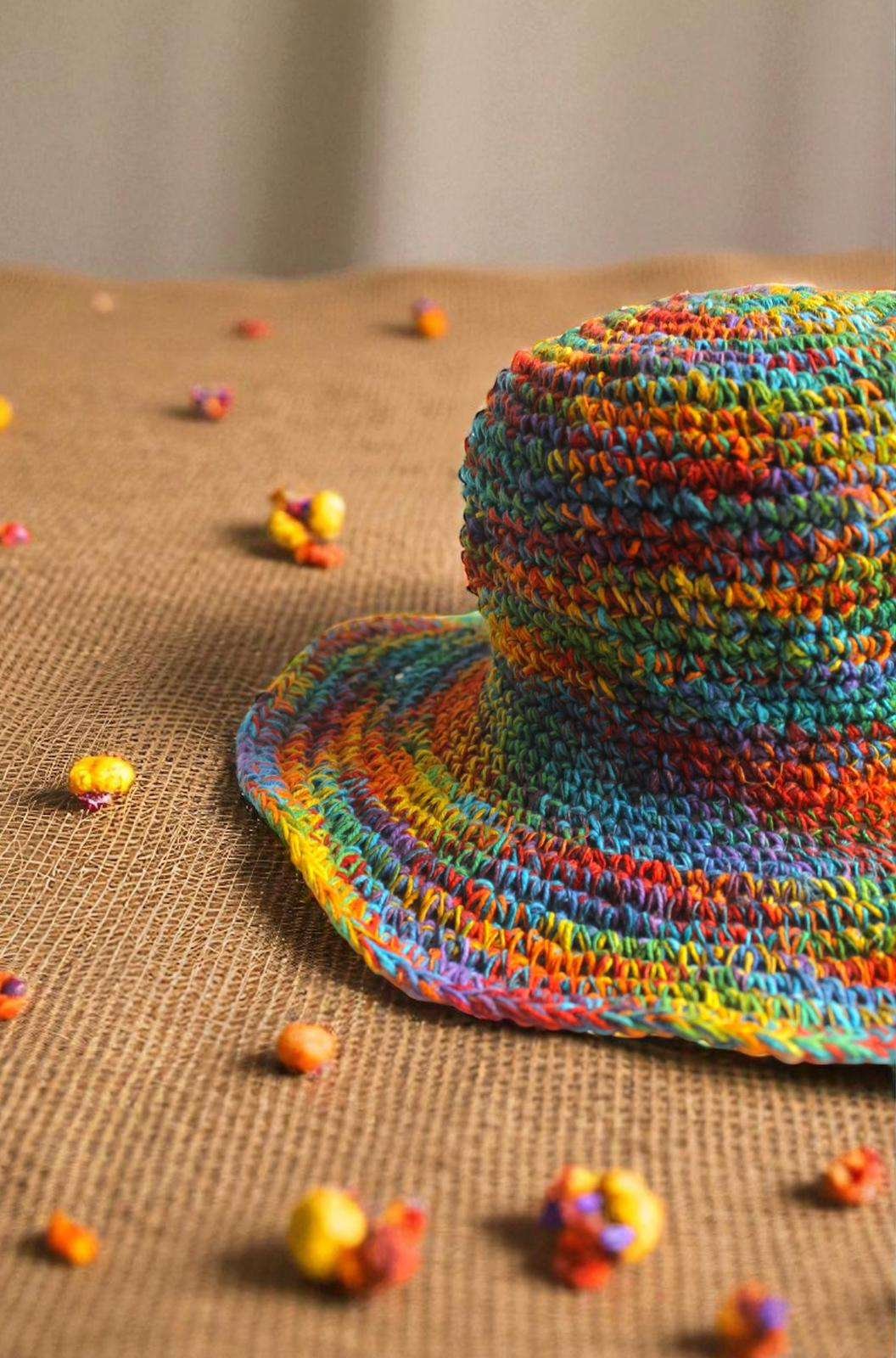 Colorful hemp hat on a beige creamy background