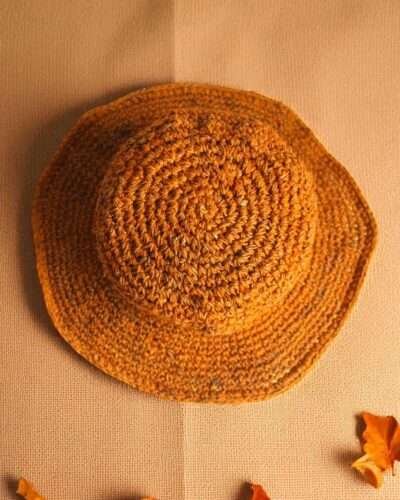 Hemp crochet hat in beige creamy background