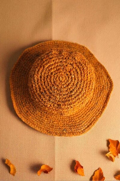 Hemp crochet hat in beige creamy background