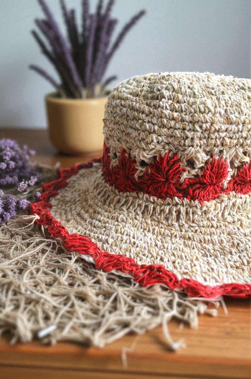 Gurkha looms red crochet hat on table zoom