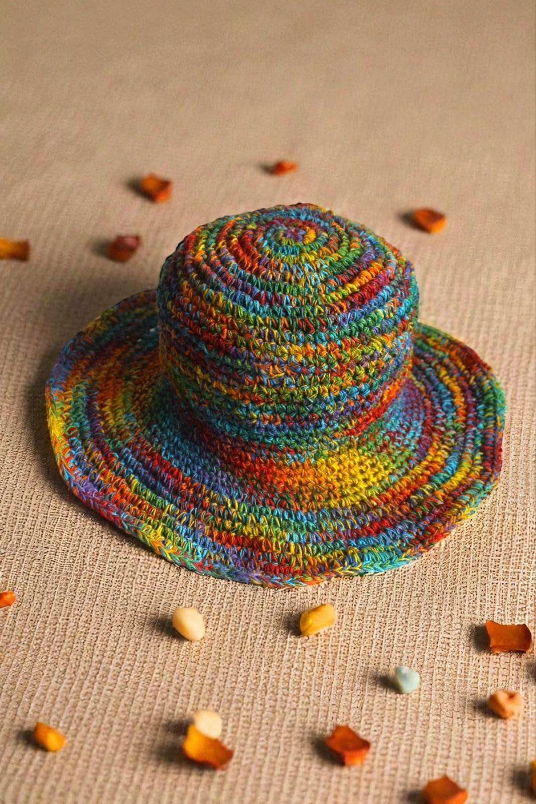 Colorful hemp hat on a beige creamy background