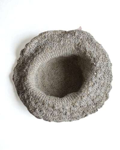 hemp crochet hat inside photo on a table