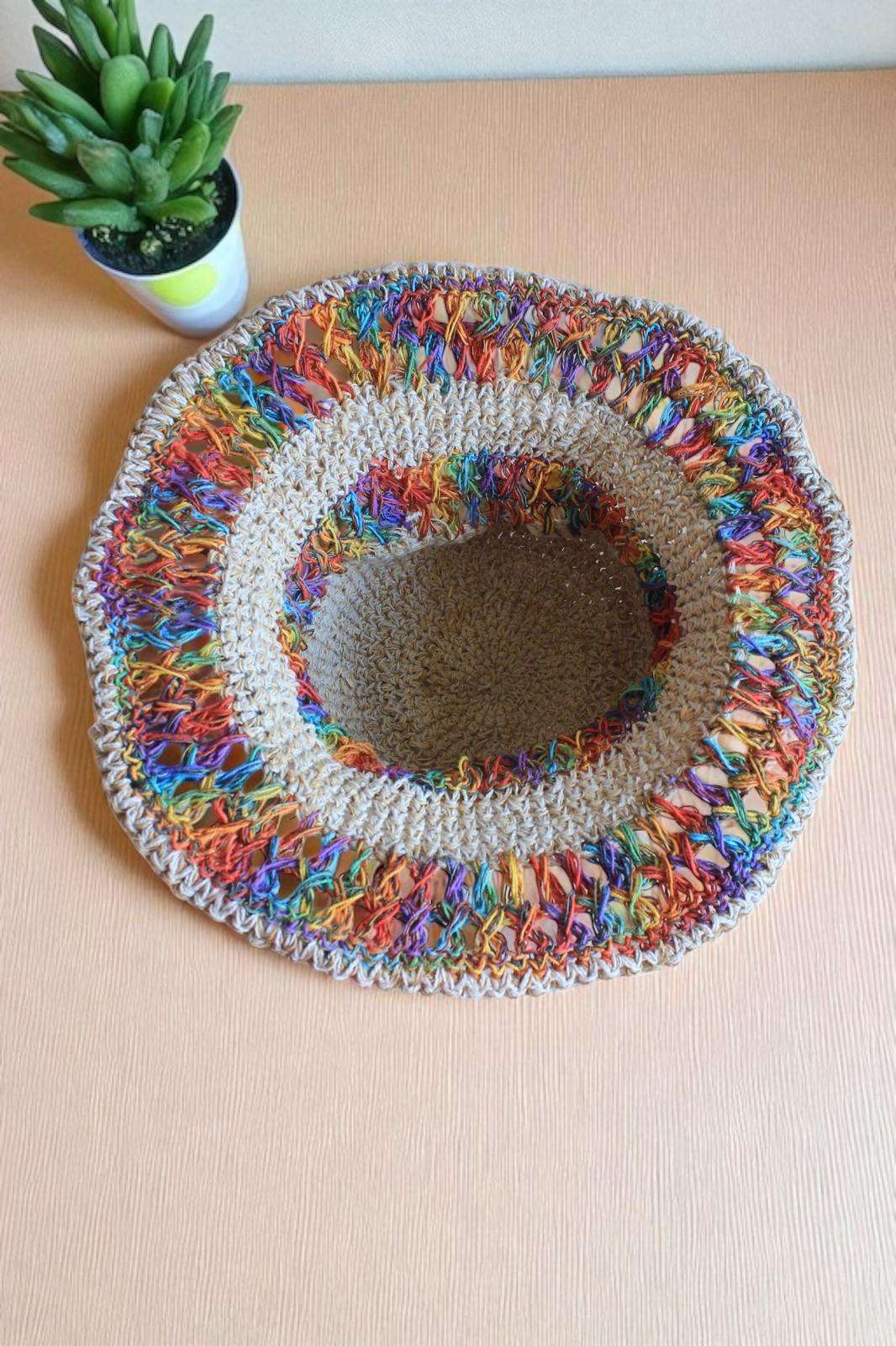 colorful crochet hat on table