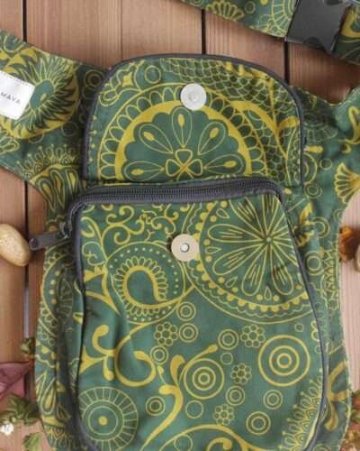 Green Cotton Bum Bag laid flat on a wooden surface