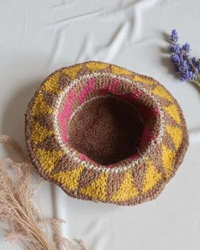 hemp hat laid flat on a white cloth showing inside of the hat
