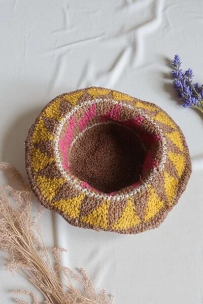 hemp hat laid flat on a white cloth showing inside of the hat