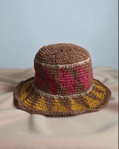 hemp hat laid flat on a white cloth front view