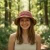 A woman wearing hemp hat in natural setting