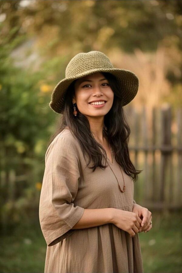 a woman wearing hemp crochet hat in natural setting