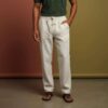 a man wearing hemp trousers in a studio