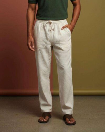a man wearing hemp trousers in a studio