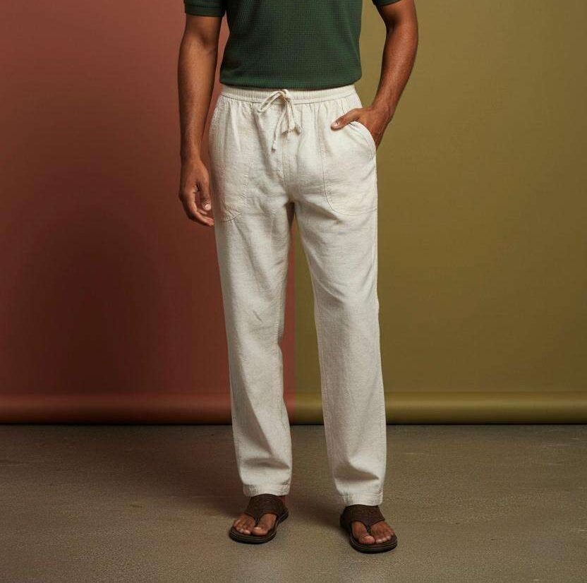 a man wearing hemp trousers in a studio