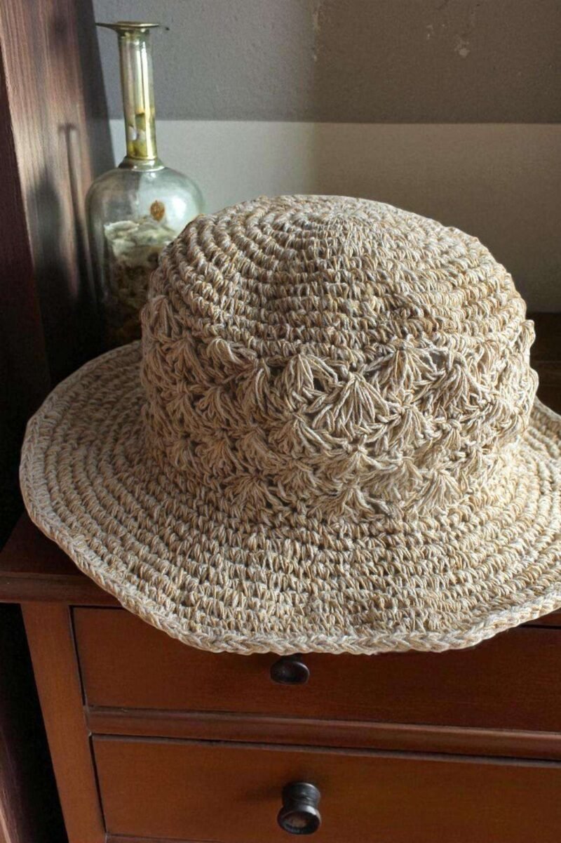 Kathmandu Knot Crochet Hat – handmade hemp hat on display focusing on the texture