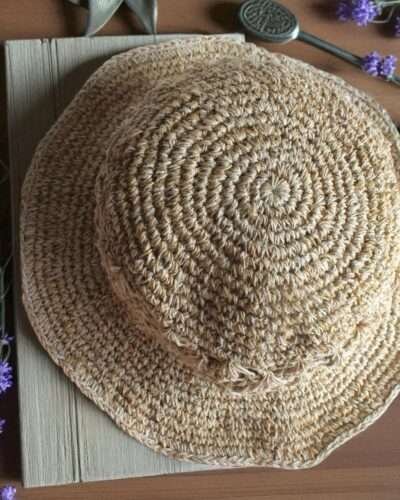 Kathmandu Knot Crochet Hat – handmade hemp hat on display
