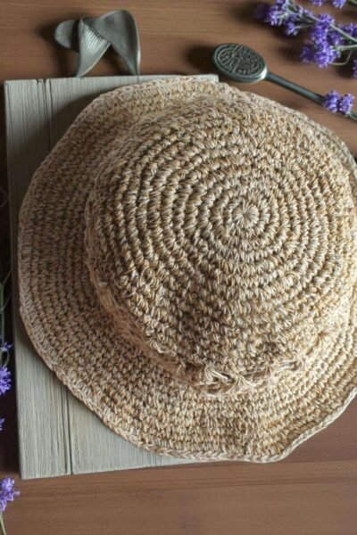 Kathmandu Knot Crochet Hat – handmade hemp hat on display