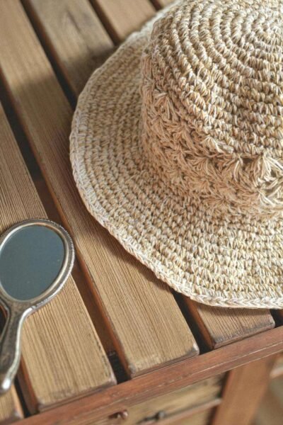 Kathmandu Knot Crochet Hat – zoomed handmade hemp hat on display