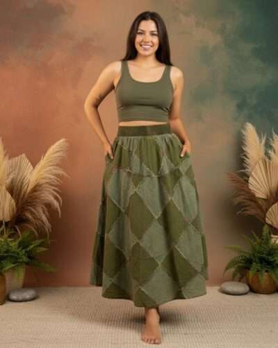 a model wearing earthy elegance skirt from spreadmaya and posing looking at the camera and hands in the pocket