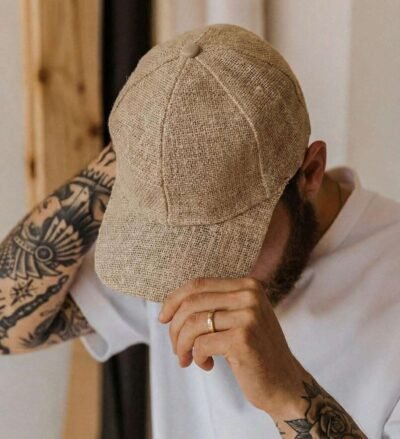 a man wearing spreadmaya hemp cap