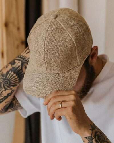 a man wearing spreadmaya hemp cap
