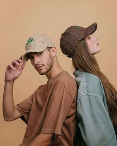 Man and woman posing together wearing beige hemp cap by SpreadMaya