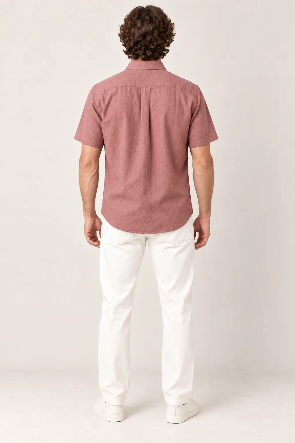 a man wearing hemp half shirt back