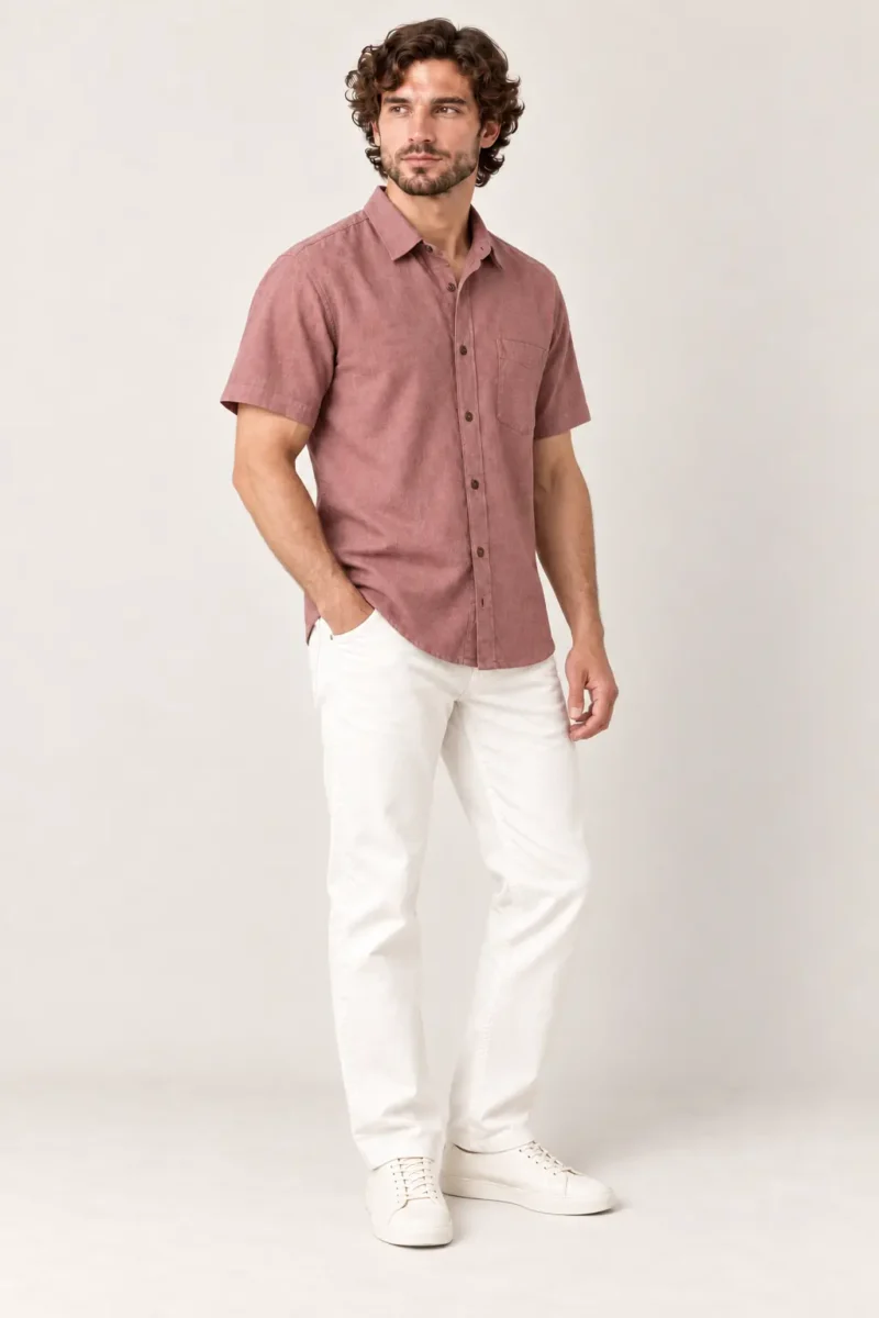 a man wearing hemp half shirt and posing