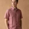 a man wearing Spreadmaya's half sleeve hemp shirt and posing