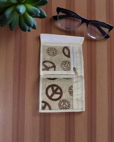 peace print wallet inside on the table