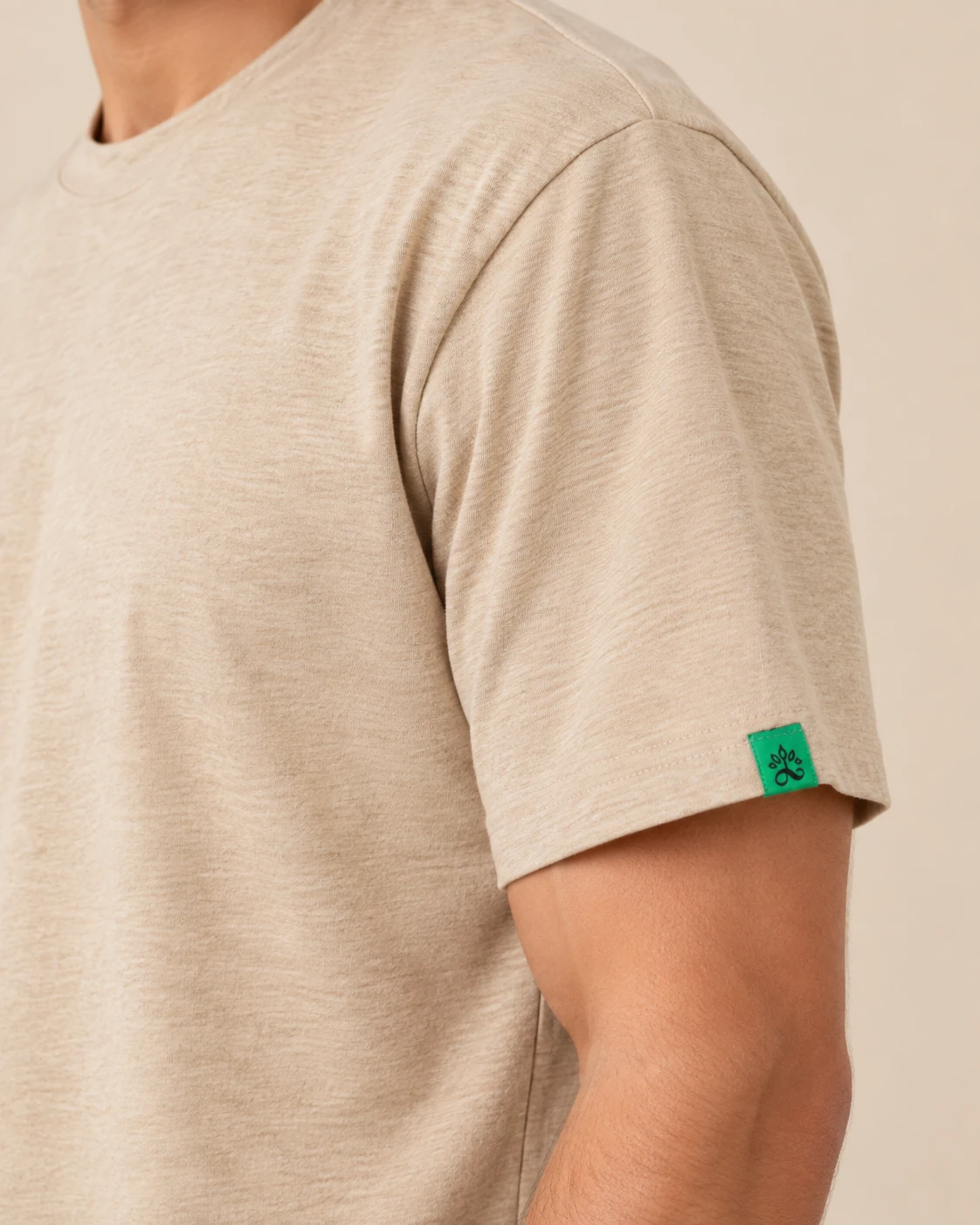 a man wearing hemp beige tshirt zoom