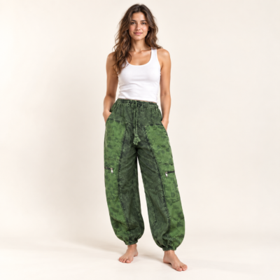 green mushroom printed pants worn by a woman