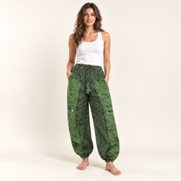 green mushroom printed pants worn by a woman