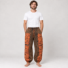 mushroom printed red trousers worn by a man