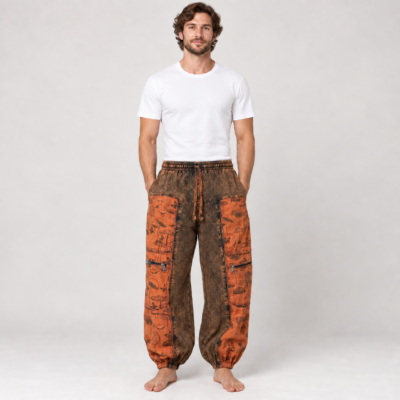 mushroom printed red trousers worn by a man
