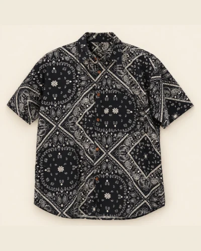 Spreadmaya black mandala hemp short sleeve shirt product photo on plain beige background.