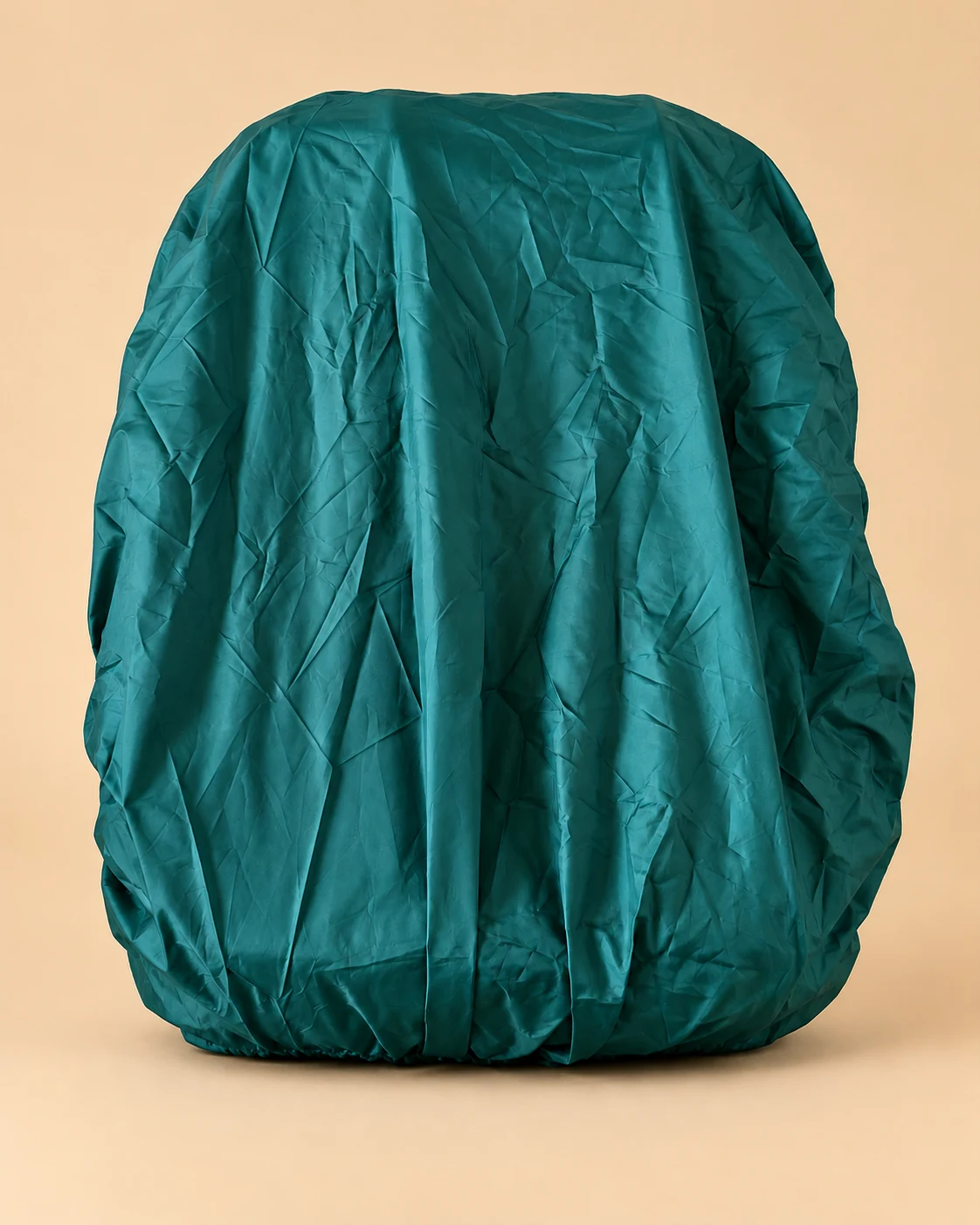 Teal waterproof rain cover protecting the SpreadMaya hemp maternity backpack from rain.
