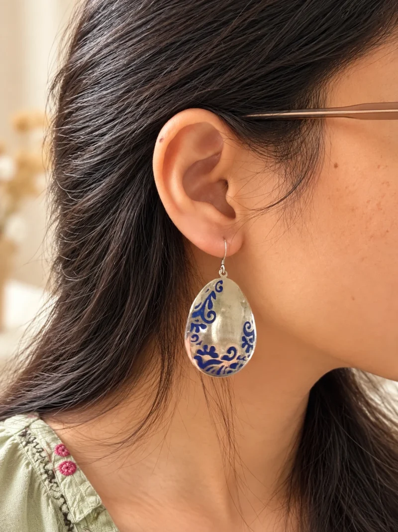 Cobalt Blue Hand-Painted Teardrop Earrings worn by a woman