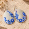 Cobalt Blue Hand-Painted Teardrop Earrings on bench